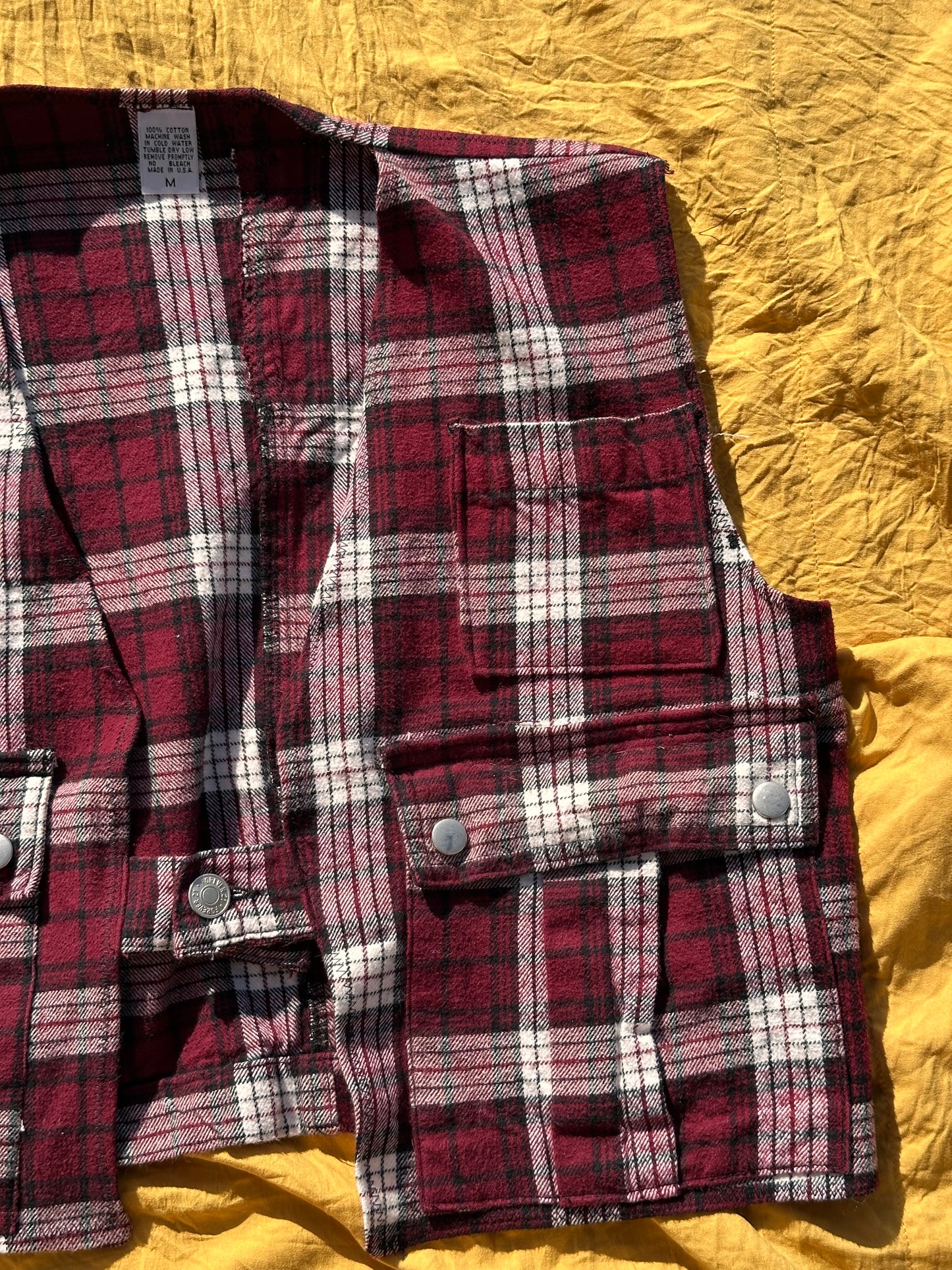 “As if” it’s Plaid vest