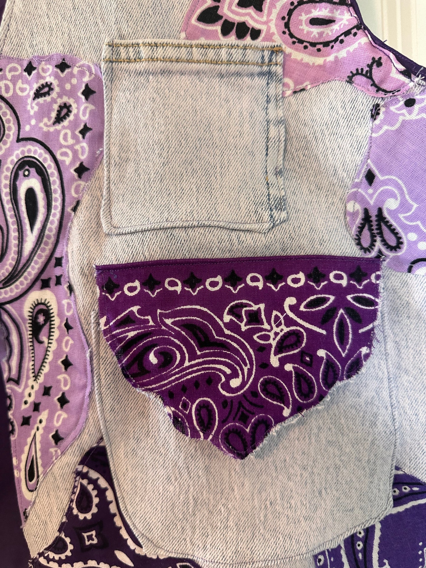 Kim’s purple bandana vest