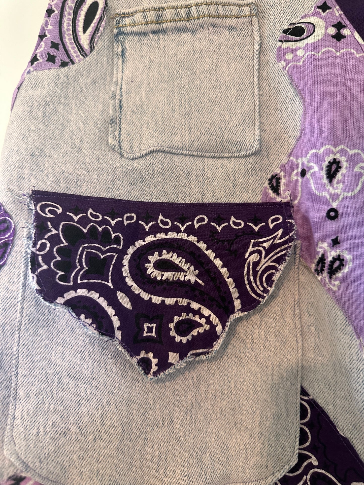 Kim’s purple bandana vest